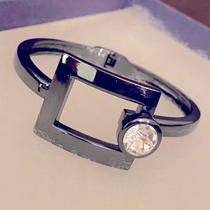 Gunmetal bangle bracelet with faux stone
